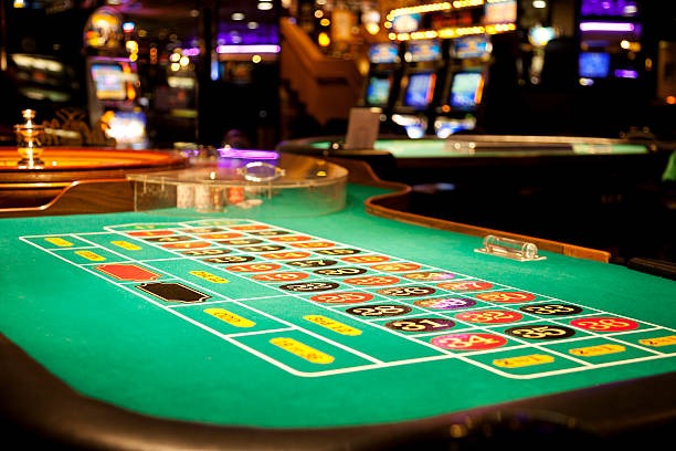 kenzo slot mobile app interface showing slot games and live casino options